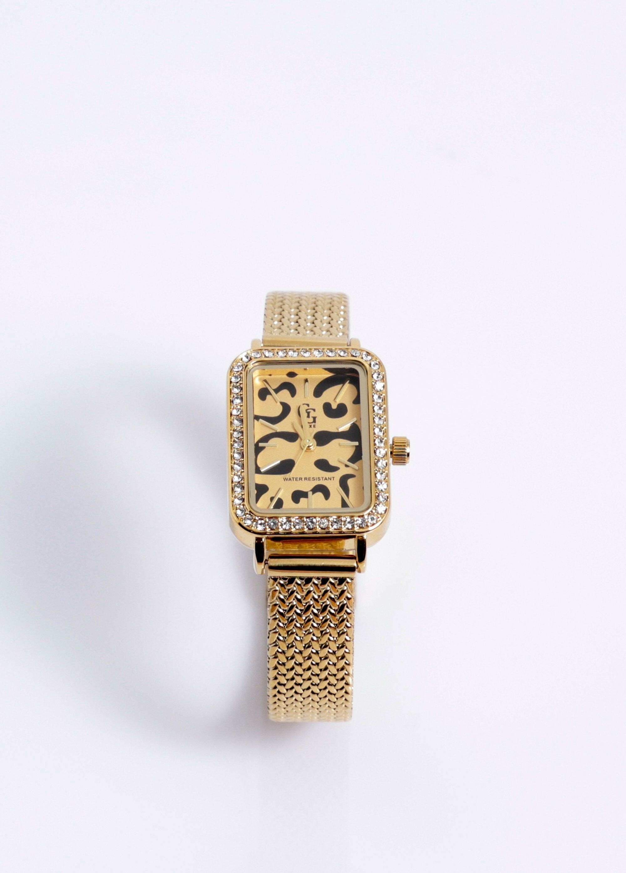 Jewelry_watch_with_a_rectangular_dial_and_rhinestones_Gold_leopard_FA1_slim
